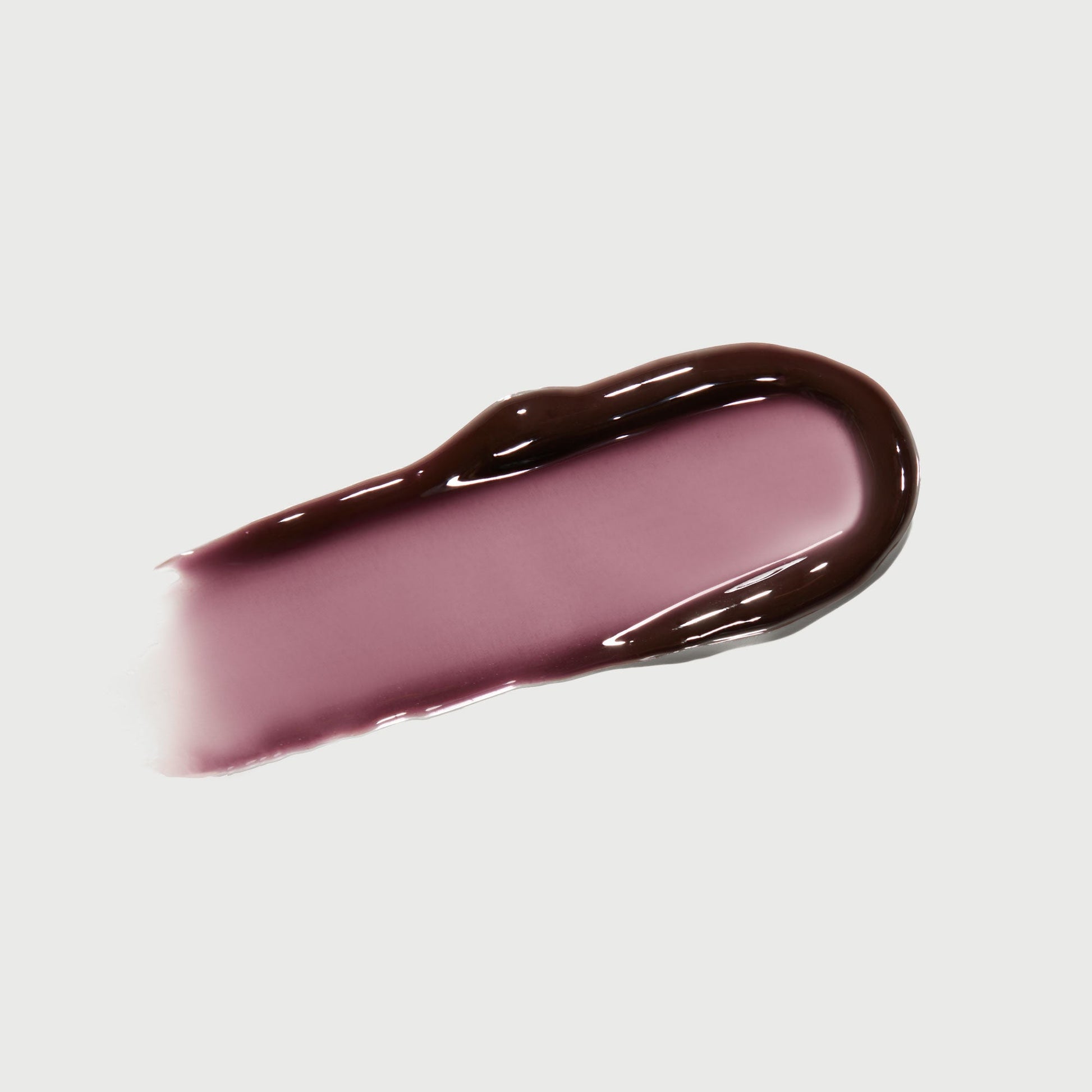 phyto-glow-lip-balm-midnight-w5 NATR-10118-Swatch-Phyto-Glow-Midnight-bonebkgd.jpg