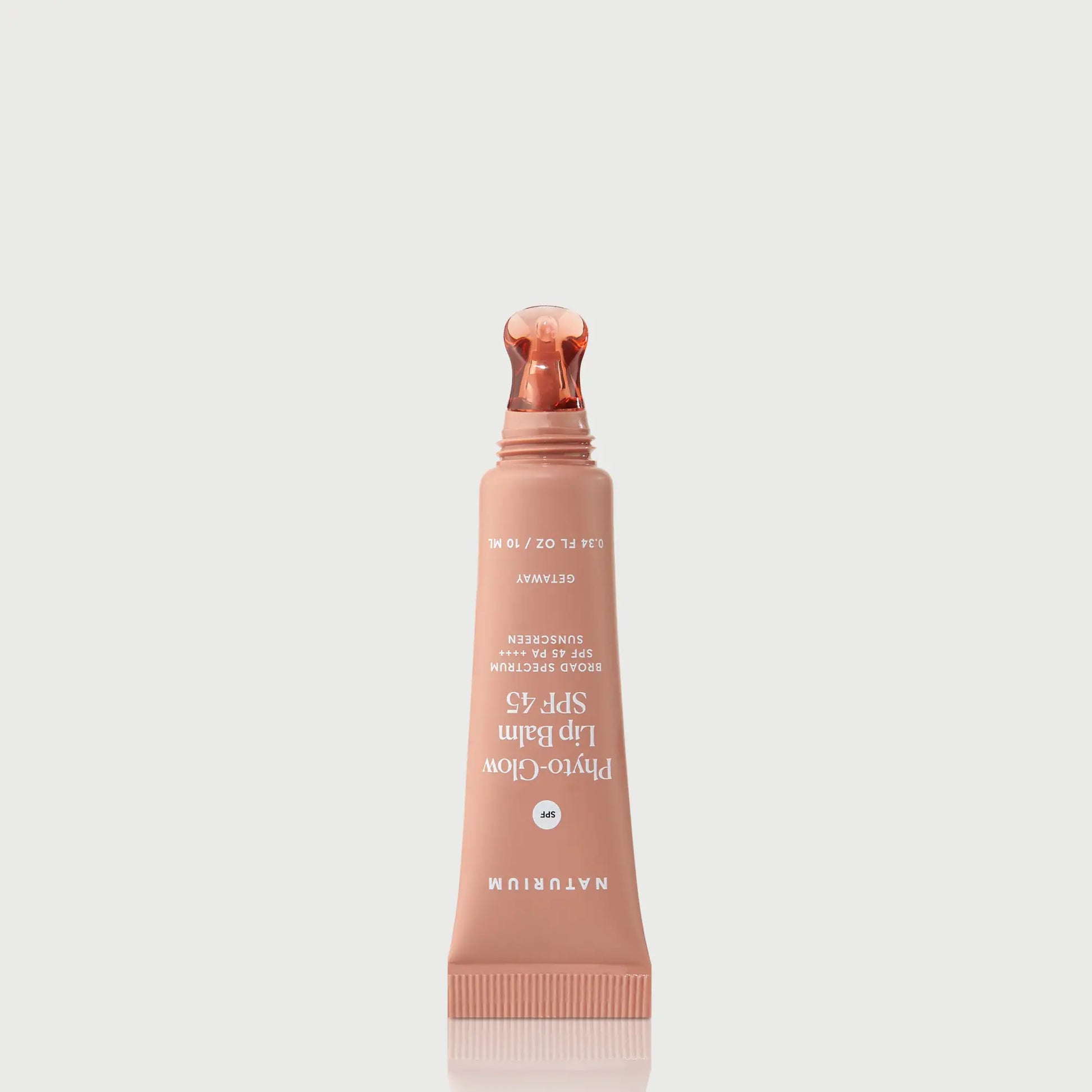 phyto-glow-lip-balm-spf-45-getaway-l7 NATR-10126_PhytoGlow_SPF_Getaway_primary_nocap_bonebkgd_1.webp